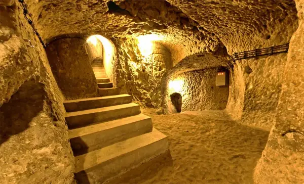 Lit stone steps and tunnels inside Derinkuyu Underground City